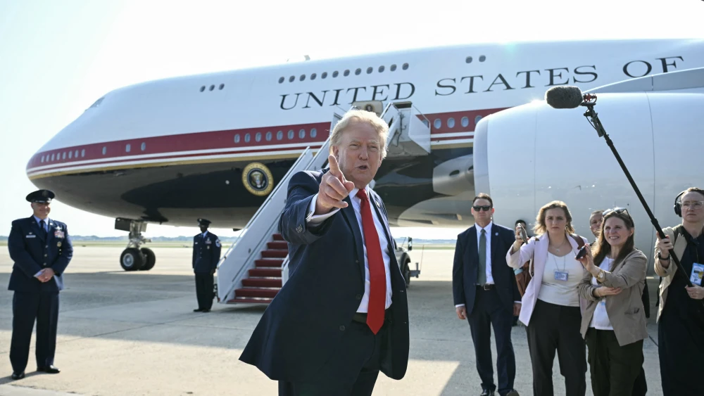 U.S. President Donald Trump speaks to the press before boarding Air Force One at Joint Base Andrews, July 1, 2026. Photo by Saul Loeb/AFP via Getty Images.