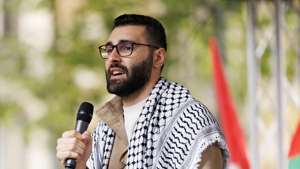 Palestinian photojournalist Mu’taz Azaiza speaks to the crowd at the end of the "14th National March For Palestine" in London, England, May 18, 2024 in London, England. Photo by Dan Kitwood/Getty Images.