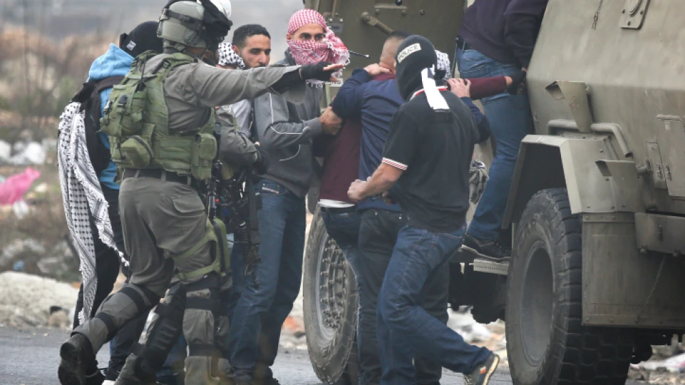 Illustrative: Israeli undercover troops arrest a Palestinian man during a protest in the West Bank City of Ramallah against U.S. President Donald Trump's latest decision to recognize Jerusalem as the capital of Israel, Dec. 13, 2017. Photo by Flash90.