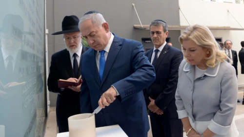 Argentine Chief Rabbi Gabriel Davidovich (left) joins Israeli Prime Minister Benjamin Netanyahu and his wife, Sara, at a ceremony at the site of the 1992 attack at the Israeli embassy in Buenos Aires, Argentina, Sept. 11, 2017. Photo by Avi Ohayon/GPO.