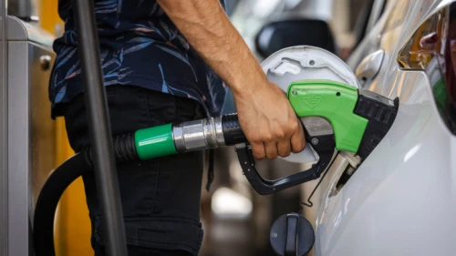 A man pumps gas at a filling station in Jerusalem, on June 28, 2022. Photo by Olivier Fitoussi/Flash90.