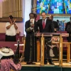 In August 2015 in Detroit, Rabbi Yechiel Eckstein (center right, at podium), founder and president of the International Fellowship of Christians and Jews, visits the New St. Paul Tabernacle Church of God in Christ, which is part of the nation's largest black Pentecostal denomination. Credit: Justin McMahan.