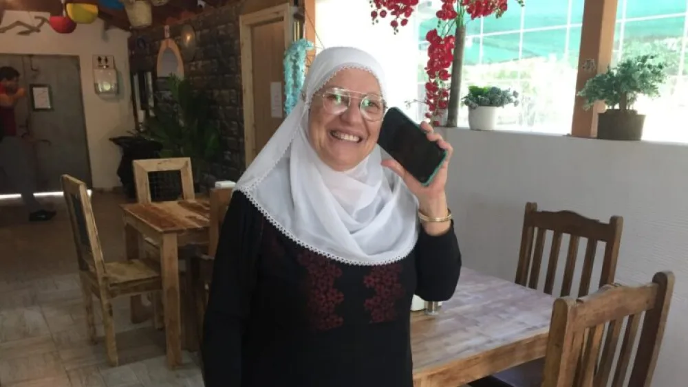 Yosara Madaji, Hani Madaji’s mother, at her restaurant, Nalchik, where she cooks Circassian dishes. Photo by Diana Bletter.