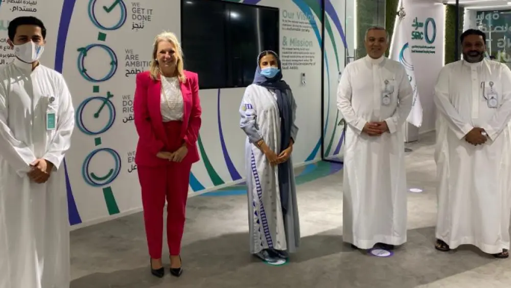 Valerie Leiser Greenfield conducts a Zoom meeting from Riyadh on behalf of two Israeli recycling companies with Sultan Saud Alsaif (with mask), and Ziyad Mohammed Al Shiha (pictured second from right) CEO of Saudi Investment Recycling company with colleagues.