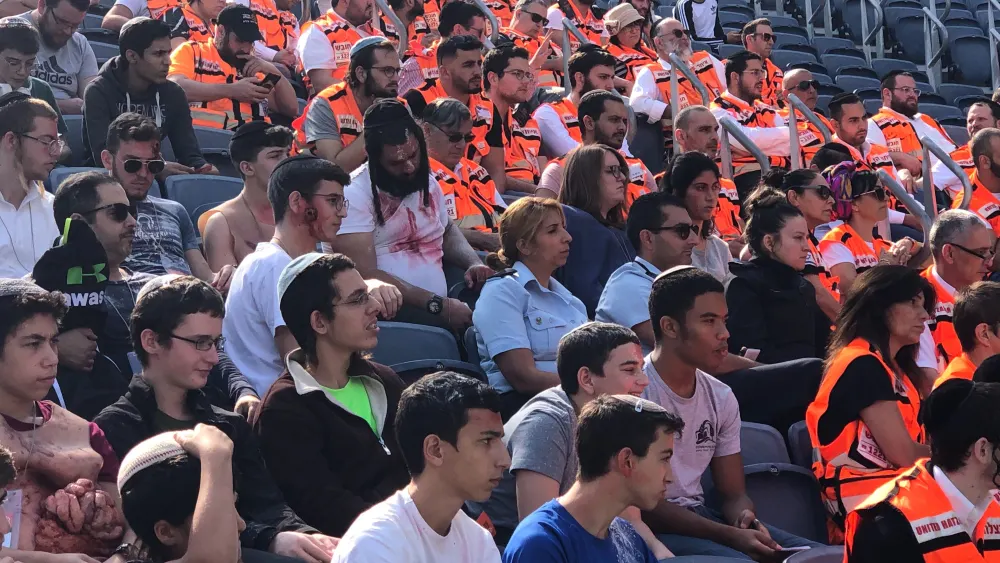 United Hatzalah emergency personnel at a mass casualty simulation at Jerusalem's Teddy Stadium. Photo by Eliana Rudee.