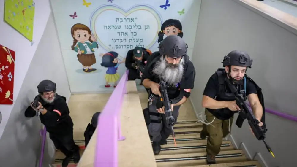 Members of the emergency security squad of Safed take part in a drill at a school, Dec. 6, 2023. Photo by David Cohen/Flash90.