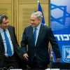 Israeli Prime Minister Benjamin Netanyahu speaks with Immigrant Absorption Minister Ze'ev Elkin during a Likud Party meeting at the Knesset, on May 18, 2015. Photo by Yonatan Sindel/Flash90.