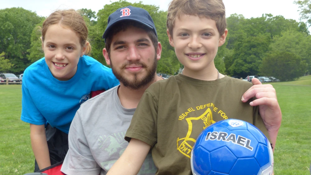 The Wilder twins Julia and Ben with one of the Brothers for Life. Credit: Wilder family.