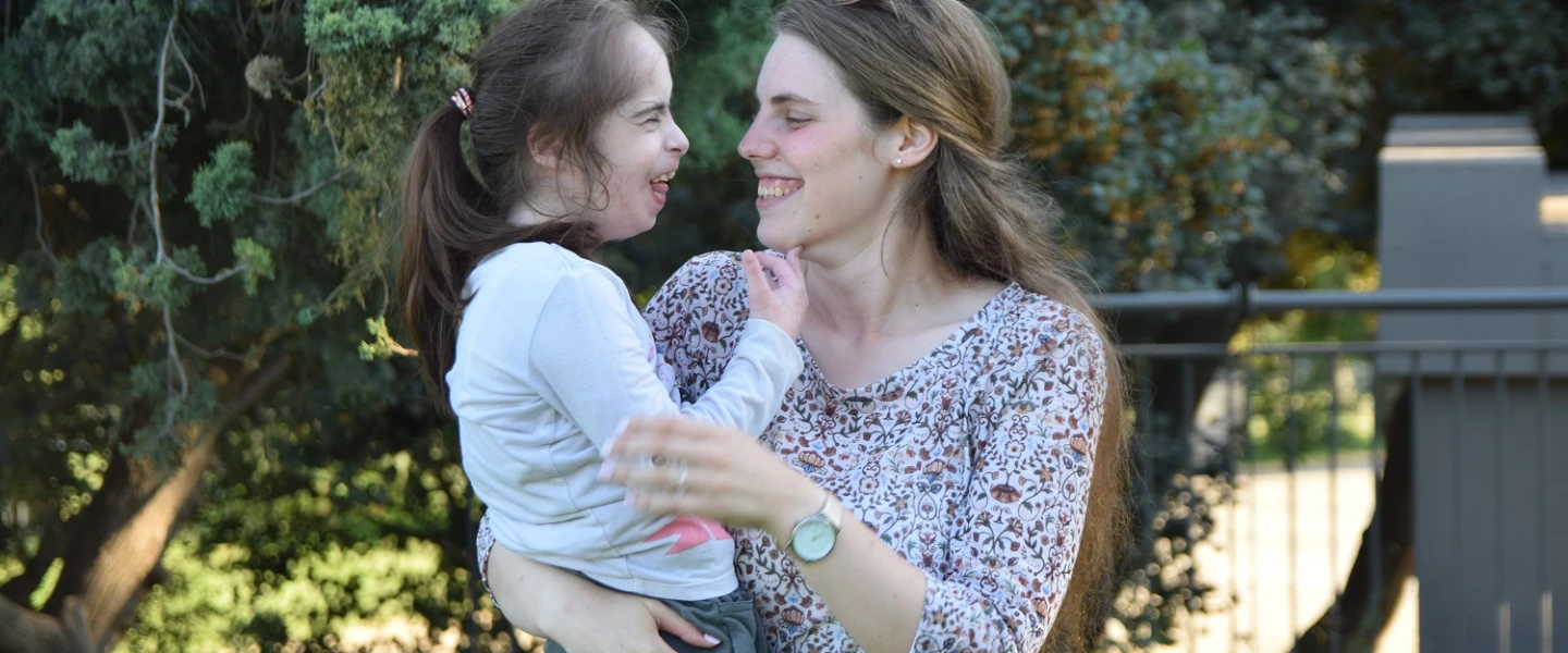 An ALEH volunteer spends time with a child with disabilities. Credit: ALEH: Advancement and Rehabilitation of Children with Complex Disabilities.