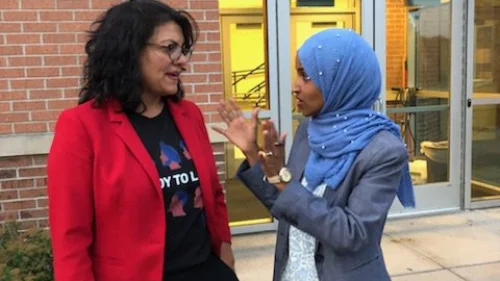Then-Congresswoman-elect Rashida Tlaib (D-Mich.) and Ilhan Omar (D-Minn.) during their campaign in August 2018. Source: Rashida Tlaib via Twitter.