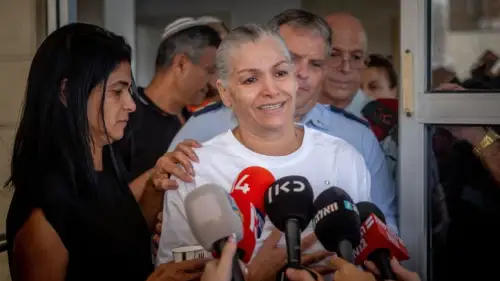 Margalit Megidish speaks to press outside her home in Kiryat Gat, Oct. 31, 2023. Photo by Yonatan Sindel/Flash90.