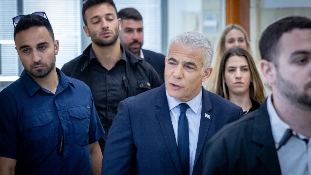 Head of opposition Yair Lapid arrives to testify in the trial against Israeli prime minister Benjamin Netanyahu at the District Court in Jerusalem on June 12, 2023. Photo by Yonatan Sindel/Flash90 *** Local Caption *** ???? ???? ?? ???? ?????? ??? ????? ????