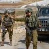Israeli soldiers block the area near the scene of a shooting attack on a bus on Route 90 in the Jordan Valley, Sept. 4, 2022. Photo by Nasser Ishtayeh/Flash90.
