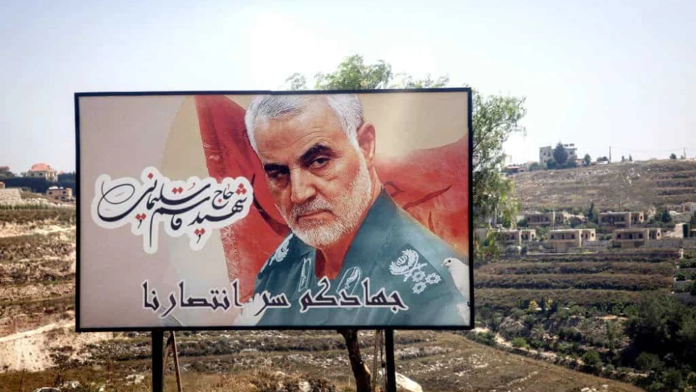 A poster of deceased Iranian Islamic Revolutionary Guard Corps commander Qassem Soleimani is seen on the roadside in Nabatieh, Lebanon on June 27, 2024. Credit: Chris McGrath/Getty Images.