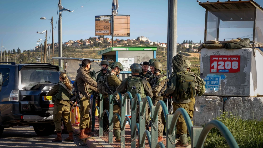 Security forces at the site where David Ben Avraham, a Palestinian convert to Judaism, was shot by IDF soldiers, near Elazar in Gush Etzion, March 21, 2024. Photo by Gershon Elinson/Flash90.