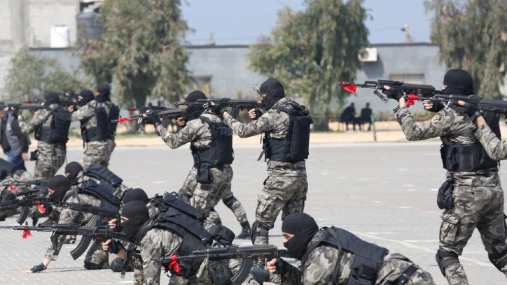 Hamas security personnel display their skills during an academy graduation ceremony in Gaza City, Feb. 27, 2023. Photo by Atia Mohammed/Flash90.