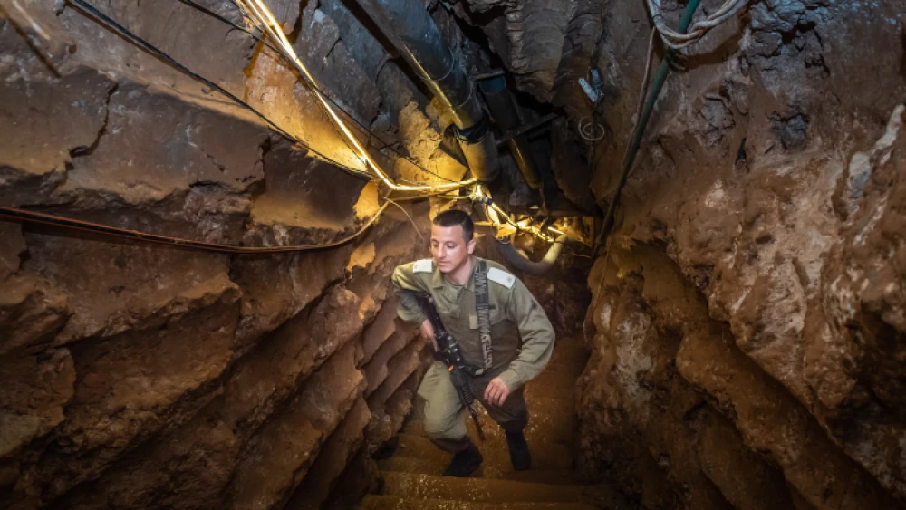 An Israeli soldier stands at a Hezbollah tunnel that crosses from Lebanon to Israel, on the border between Israel and Lebanon in northern Israel, on May 29, 2019. Photo by Basel Awidat/Flash90.