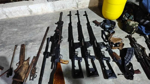Israel Defense Forces soldiers confiscated these weapons during a raid in southern Syria to apprehend a suspected Islamic State-affiliated terrorist, December 2025. Credit: IDF.