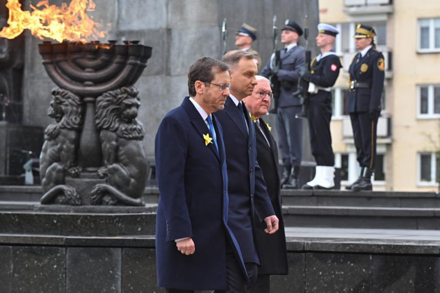 From left: Israeli President Isaac Herzog, Polish President Andrzej Duda and German President Frank-Walter Steinmeier at the Monument to the Ghetto Heroes in Warsaw for a ceremony marking 80 years since the Warsaw Ghetto Uprising, on April 19, 2023. Photo by Kobi Gideon/GPO.