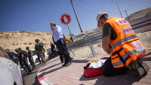 Israeli security personnel at the scene of a shooting attack outside the Jewish town of Tekoa in Judea, July 16, 2023. Photo by Chaim Goldberg/Flash90.