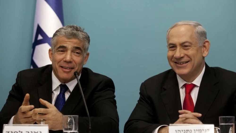 Israeli Prime Minister Benjamin Netanyahu and then-Finance Minister Yair Lapid during a press conference on July 3, 2013. Photo by Flash90.
