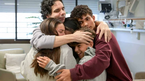 Ofer Kalderon reunites with his children Rotem, Gaya, Erez and Sahar on Feb. 1, 2025. Erez and Sahar, who were also abducted on Oct. 7, 2023, were released in November 2023. Photo by Maayan Toaf/GPO.