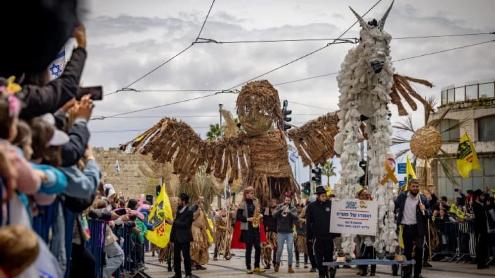 Israelis take part in the Jewish holiday of Purim parade (Adloyada), in Jerusalem, March 25, 2024. Photo by Yonatan Sindel/Flash90 *** Local Caption *** ????? ???? ???????