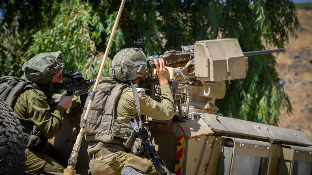 Israeli soldiers seen in the village of Ghajar on the border with Lebanon, in northern Israel, after a rocket fired from Lebanon landed in an open area, July 6, 2023. Photo by Ayal Margolin/Flash90.
