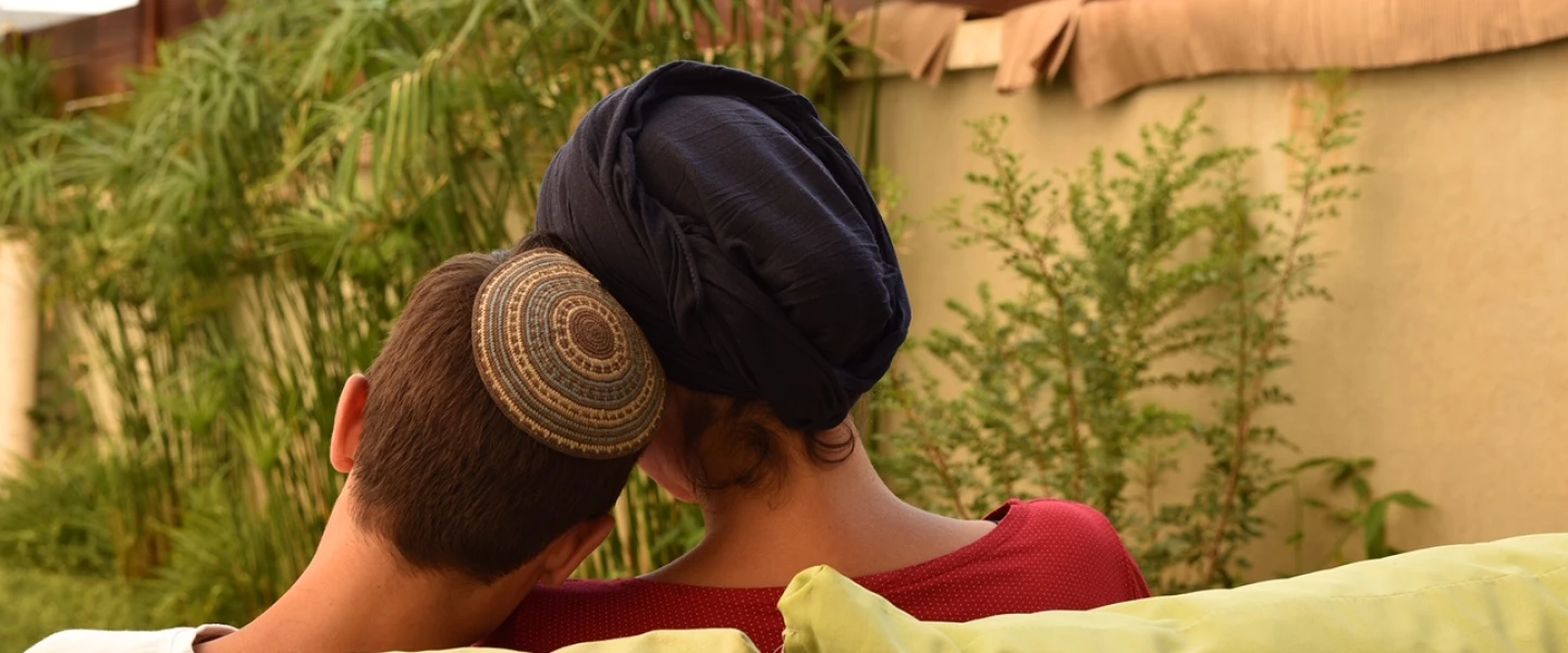 One of the house mothers and a child at the Neve Michael children's home in Israel. Photo by Chanan Nachmani.