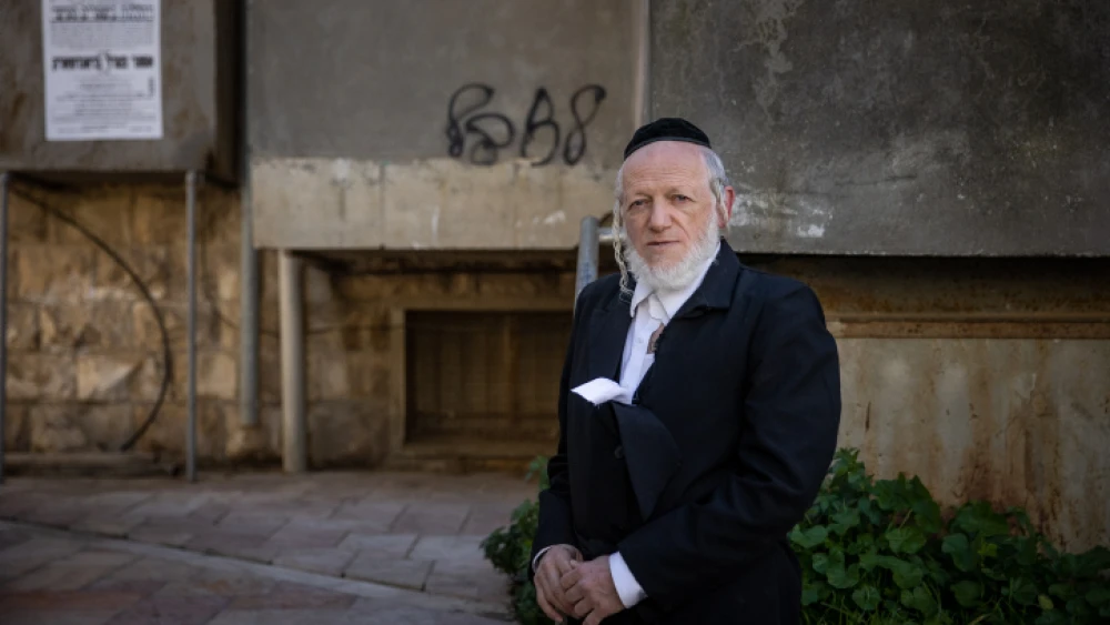 Yehuda Meshi Zahav, chairman of Israel's ZAKA rescue unit outside sitting shivah for his mother in the ultra-Orthodox neighborhood of Mea Shearim in Jerusalem, Jan. 19, 2021. Photo by Yonatan Sindel/Flash90.