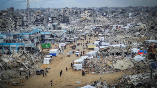 Palestinians shop at a market amid destruction caused by the war against Israel, in Jabalia, the northern Gaza Strip, Feb. 5, 2025. Photo by Khalil Kahlout/Flash90.