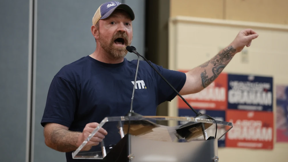 Democratic Senate candidate Graham Platner speaks during a town hall about a Vision for a Healthy Society in Portland, Maine, on May 20, 2026. Photo by Joe Raedle/Getty Images.