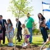 A tree planting ceremony on Coushatta tribal lands, including Consul General of Israel to the Southwest U.S. Gilad Katz (third from right, wearing green) and his family. Credit: Alyssa Wallace.