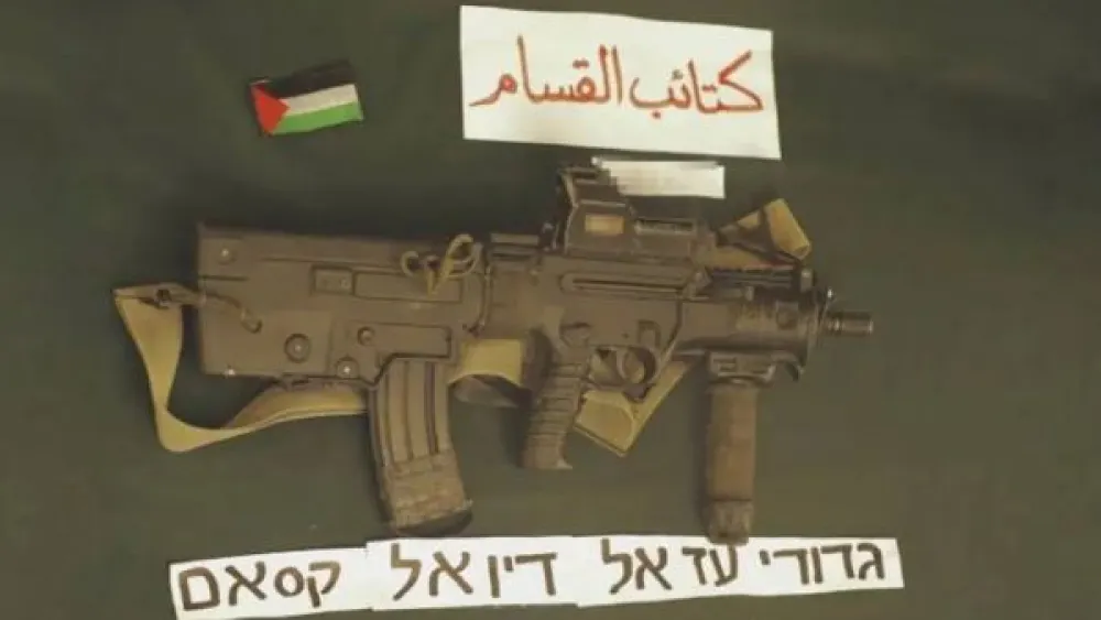 Hamas presented the Tabor rifle that it claimed belonged to IDF Lt. Hadar Goldin. Credit: Twitter