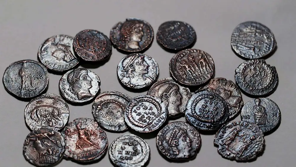 The rare hoard of 22 copper coins over 1,600 years old discovered in the Lower Galilee. Credit: Emil Aladjem, Israel Antiquities Authority.