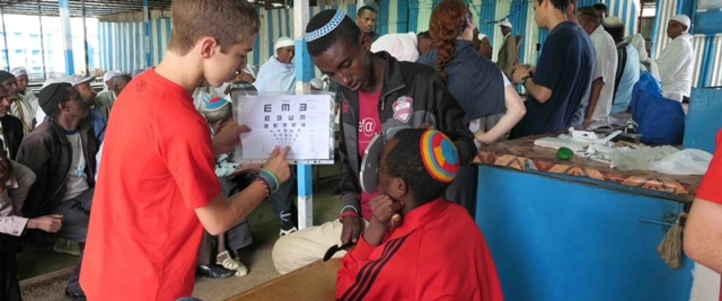 Volunteers test patients for short- and near-sightedness. Photo by Elisa Hartstein.