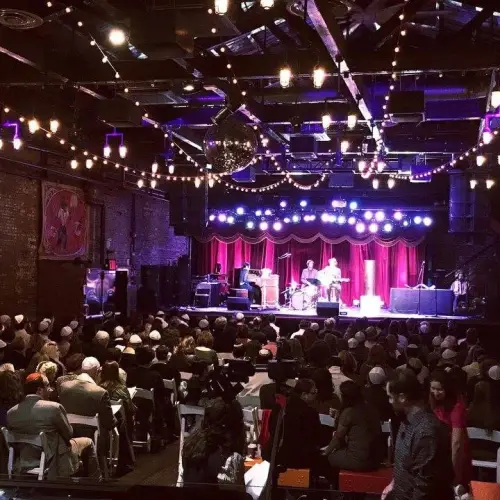 The High Holiday services, often called “Bowl Hashanah,” are hosted by Friday Night Jams/Because Jewish and will be led by Rabbi Daniel Brenner; Jeremiah Lockwood (musical coordinator); vocalist and bass player Yula Beeri; and trumpeter and Antibalas charter member Jordan McLean. Credit: BecauseJewish.com.