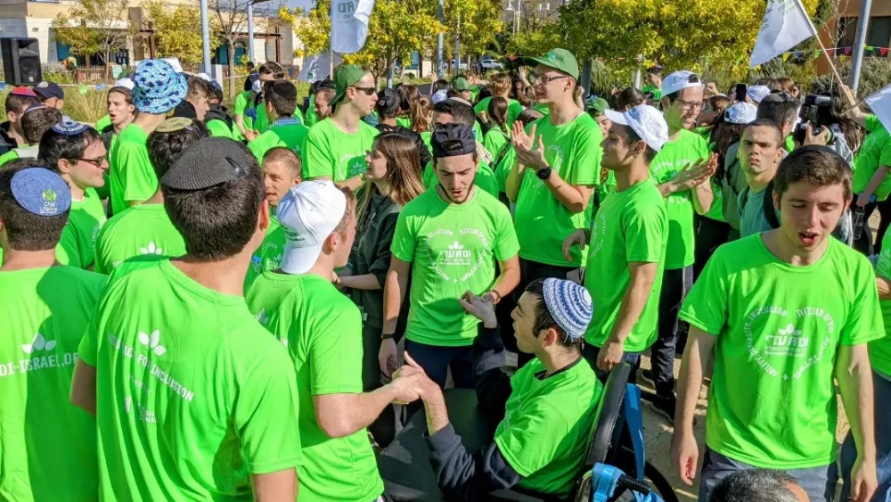 Students from JNF-USA’s Alternative Winter Break, Mechinat Ruach HaNegev, Torah Tech and Yeshivat Ashreinu dance and sing with ADI residents and special-education students at ADI’s second annual “Race for Inclusion” on Dec. 29, 2022.