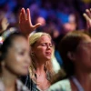 Evangelical Christians from around the world sing and recite prayers as they attend the 2013 Jerusalem Chairman's Conference, hosted by the Israel Allies Foundation, at the International Convention Center in Jerusalem, on Sept. 22, 2013. Photo by Flash90.