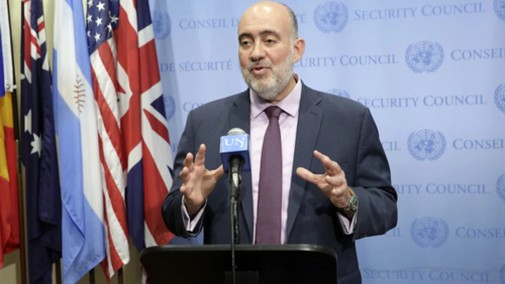 Click photo to download. Caption: Israeli Ambassador to the U.N. Ron Prosor, pictured here speaking to journalists on July 10 following a U.N. Security Council meeting on the Israel-Hamas war, says it is "about time Jewish employees at the U.N won’t be obligated to work on Yom Kippur." Credit: UN Photo/Evan Schneider.