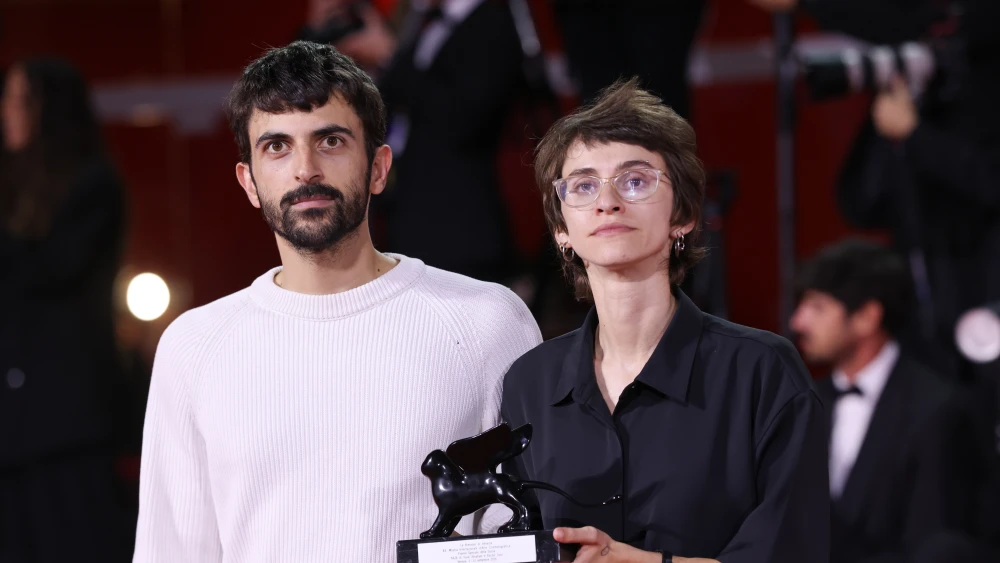 Yuval Abraham and Rachel Szor pose with the Special Jury Prize Award for "Naza" at the Winners Photocall during the 83rd Venice International Film Festival at Sala Grande on Sept. 12, 2026, in Venice, Italy. Photo by Stephane Cardinale/Corbis/Corbis via Getty Images.