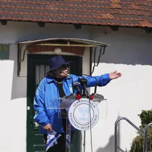 Esther Yaron speaks at the old train station in Thessaloniki, Greece, at an event marking 80 years since the deportation of the city’s Jews, March 19, 2023. Credit: Courtesy.