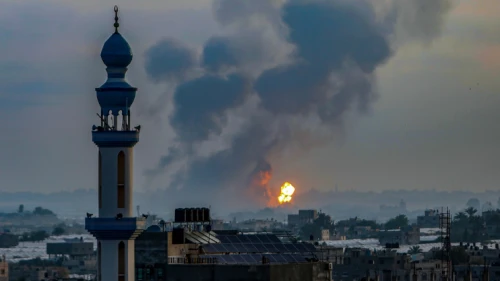 Smoke and flames rise after an Israeli airstrike on a site of the Izz al-Din al-Qassam Brigades, the armed wing of Hamas, west of Khan Yunis in the southern Gaza Strip, May 11, 2021. Photo by Abed Rahim Khatib/Flash90.