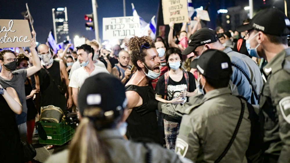 Israelis protest against Israeli Public Security Minister Amir Ohana in Tel Aviv on July 28, 2020. Photo by Tomer Neuberg/Flash90.