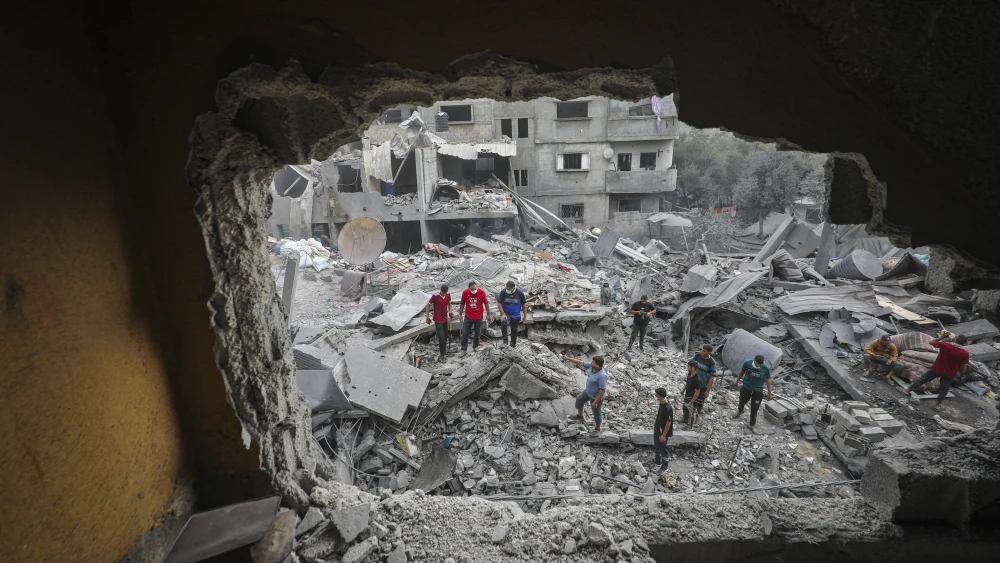 Rubble of damaged buildings is seen following an Israeli airstrike on a residential block in Al-Zawayda, central Gaza Strip, on Oct. 11, 2026. Photo by Ali Hassan/Flash90.