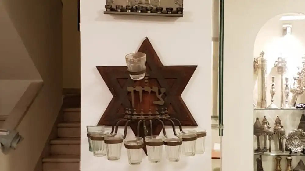 A sample of the hanukyiot collection hailing from (from top to bottom) Italy, Morocco, India, Poland and Greece. Credit: Courtesy.