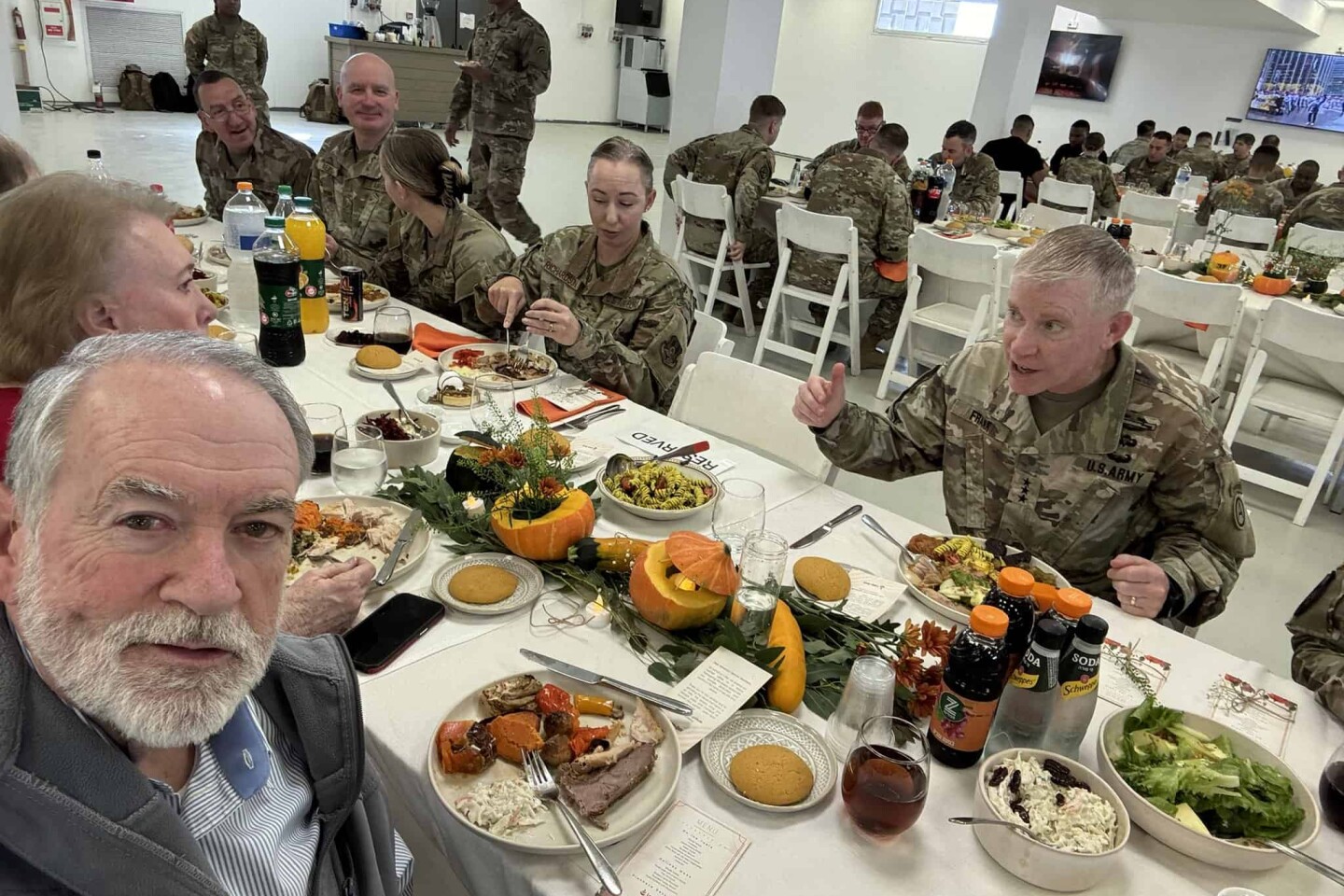 U.S. Ambassador to Israel Mike Huckabee and his wife, Janet, celebrate Thanksgiving together with American service members stationed in Kiryat Gat, Israel, on Nov. 27, 2025. Credit: The U.S. Embassy Jerusalem.