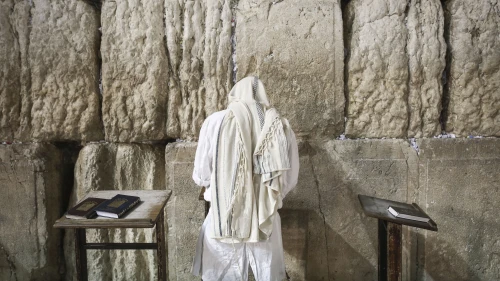 A Jewish worshipper at the Western Wall in the Old City of Jerusalem at the end of Yom Kippur, the Day of Atonement, and the holiest of Jewish holidays. Israel comes to a standstill for 25 hours during the holiday, when Jews traditionally fast and Israelis are prohibited from driving. Photo by Flash90.