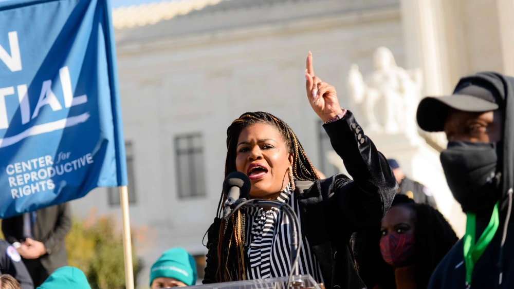 Rep. Cori Bush (D-Mo.) speaking at an abortion rights rally at the U.S. Supreme Court in Washington, D.C., on Dec. 1, 2021. Credit: Shala W. Graham/Shutterstock.