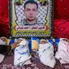 Imprisoned Palestinian terrorist Ahmad Shamali with his four children, who were reportedly conceived with sperm smuggled out of Israel’s Nafha Prison to the Gaza Strip. Source: Screenshot.